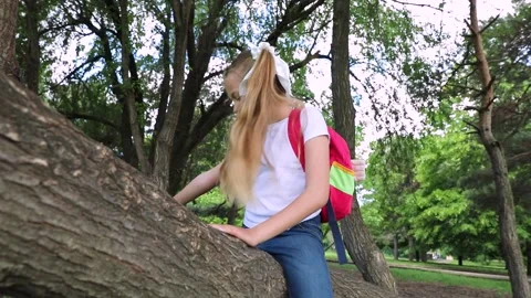 A kid in a green park. Stock Footage 136164894