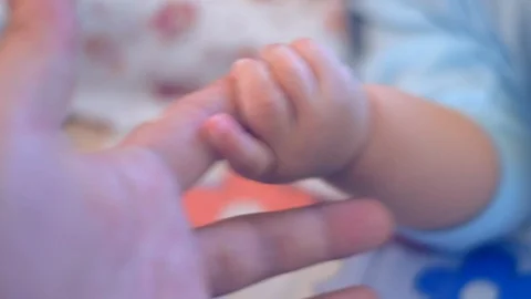 Kid hand moving and catch Stock Footage 122150005