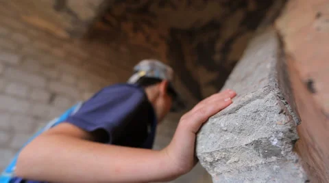 Kid hand on old building Stock Footage 37558702