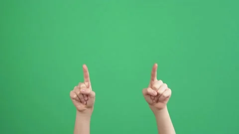 Kid hand pointing at someone, rising up and show gesturing two hands thumbs up Stock Footage 158059005