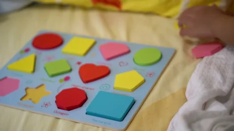 Kid hand sorting the shape block toy. Stock Footage 171848039