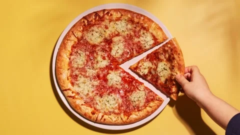 Kid hand taking slice of vegetarian home made pizza with vegan cheese Stock Footage 145266572
