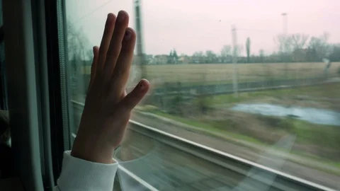 Kid hand on the train window Stock Footage