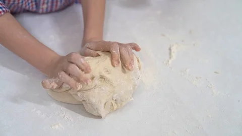 Kid hands study knead yeast dough for pizza or pie Stock Footage 126901771