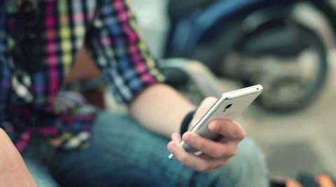 Kid hands writing sms on smartphone HD Stock Footage 31823003