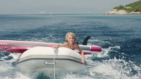 Kid having fun in boat. Video stock 203483017