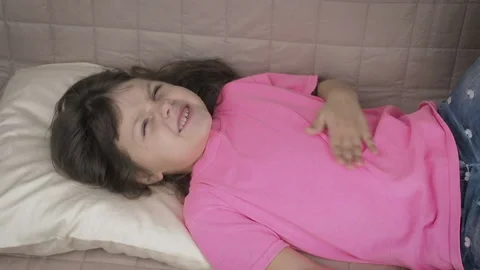 Kid having stomachache. Stock Footage 99940372