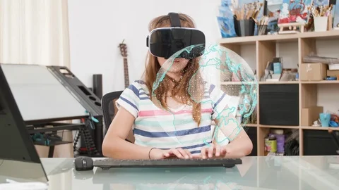 Kid at home doing her homework in a virtual space Video stock 108161075