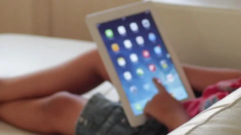 Kid at Home play with iPad Stock Footage 40751858