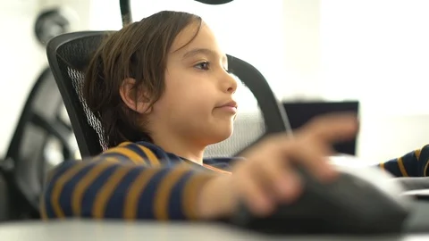 Kid at home using computer Stock Footage 105237714