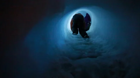 Kid in ice tunnel Stock Footage 35801195