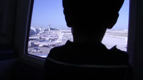 Kid inside train planes airport Stock Footage 973198