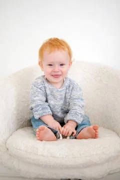 The kid in jeans Stock Photos