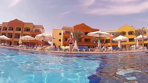 Kid jump into a pool Stock Footage 75453891