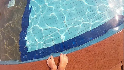 Kid jump into a pool Stock Footage 75456079