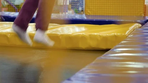 Kid is jumping on trampoline Stock Footage 71260587