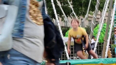 Kid jumping on trampoline Stock Footage 78487460