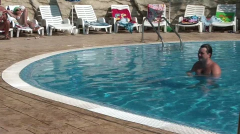 Kid jumps in the pool Stock Footage 668652