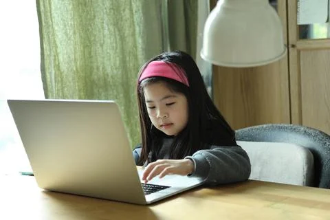 Kid with Laptop Stock Photos