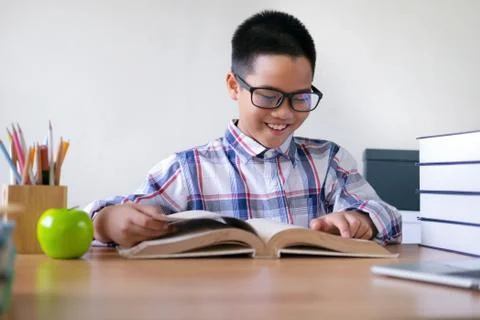 Kid is learning in class. Stock Photos
