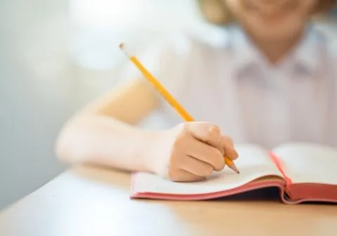 Kid is learning in class Stock Photos