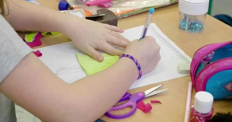Kid learning to draw with tracing shape ... | Stock Video | Pond5