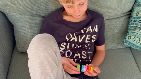 Kid learning math with a toy - homeschooling Stock Footage 286105723