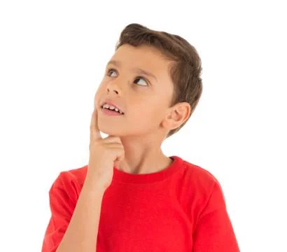 Kid looking up and thinking Foto stock