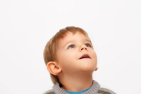 Kid looking up Stock Photos