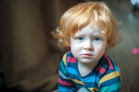 The kid looks at the camera Stock Photos