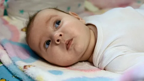 The kid looks at the environment with interest, close-up Stock Footage 91200306