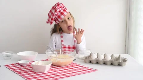 Kid make cookie, make fun, enjoy. Child try and eat dough, lick fingers Stock Footage 178526503