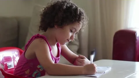 Kid making homework Stock Footage 12623347