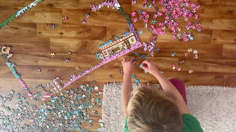 Kid making a puzzle Stock Footage 286105765