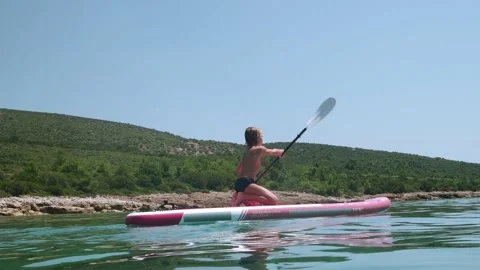 Kid on paddle board. Stock Footage 202636496