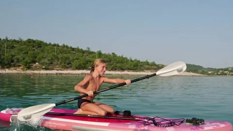 Kid on paddle board. Stock Footage 202637321