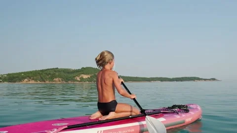 Kid on paddle board. Stock Footage 202637421