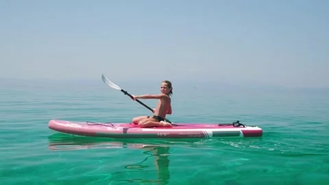 Kid on paddle board. Stock Footage 202720281