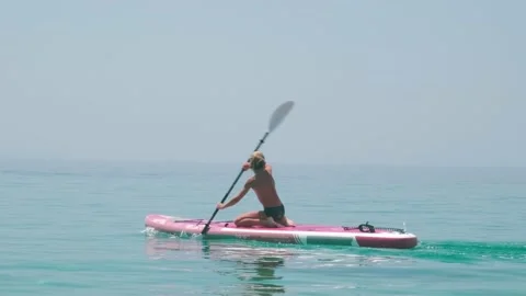 Kid on paddle board. Stock Footage 203483515