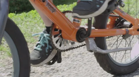Kid Pedaling Bicycle Stock Footage 40732721