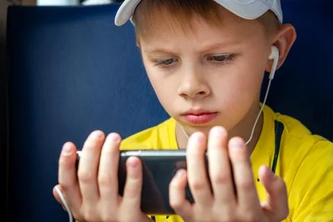 Kid with a Phone Stock Photos