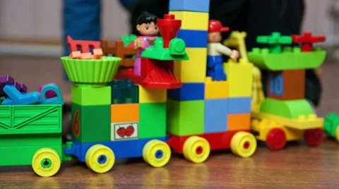 Kid play with a constructor train Stock Footage 44548061