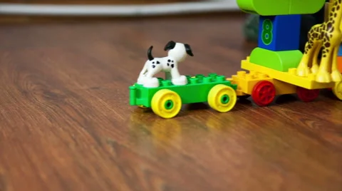 Kid play with a toy train Stock Footage 44551514