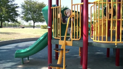Kid on Playground 2-Pond5 Settings Stock Footage 8554142