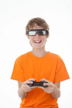 Kid playing 3d game with control Stock Photos