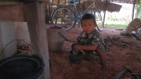 Kid playing alone in the countryside Video stock 75886532