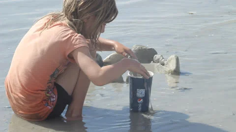 Kid playing on beach Stock Footage 27067676