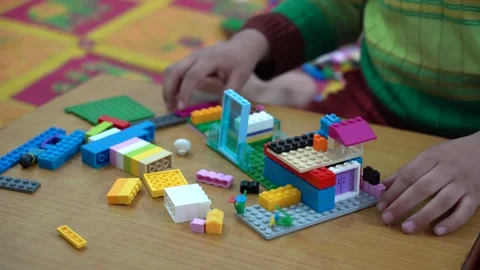 Kid playing with blocks Stock Footage 146157637