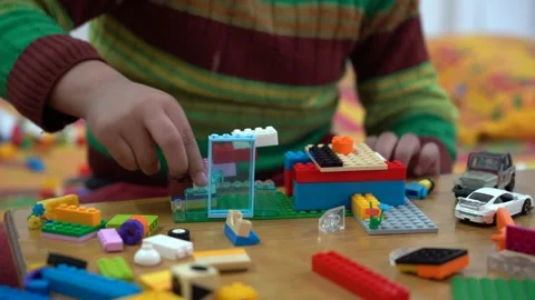 Kid playing with blocks Stock Footage 146157646
