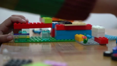 Kid playing with blocks Stock Footage 146157654
